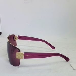 Gucci womens pink sunglasses with gold trim